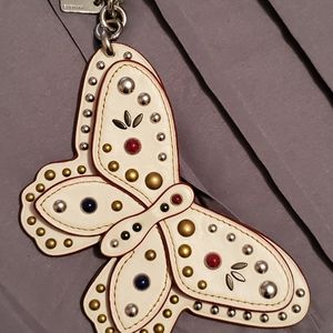 Coach cream studded butterfly keychain